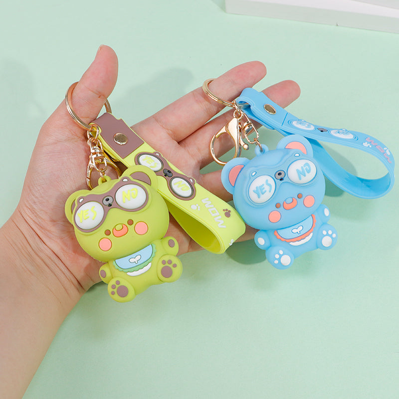Cute Pop-Eye Bear Squishy Keychain – Funny Stress-Relief Toy & Bag Charm